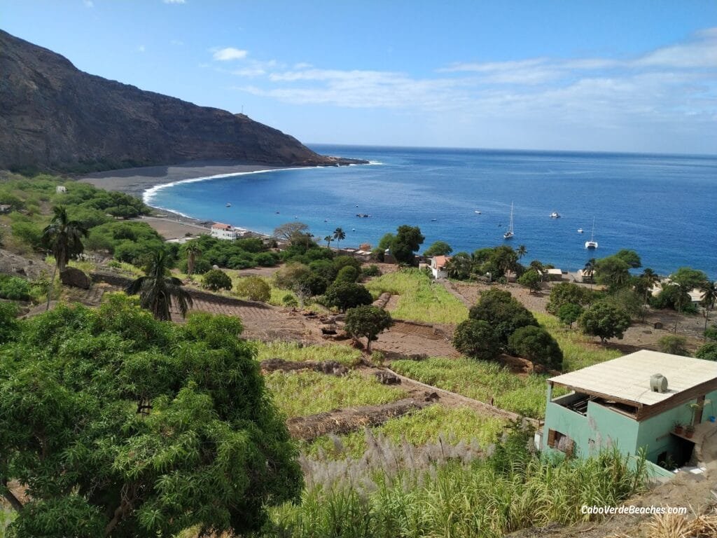 The Beach of Tarrafal de Monte Trigo in Santo Antão is a tranquil paradise with black volcanic sands, crystal-clear waters, and breathtaking mountain views.