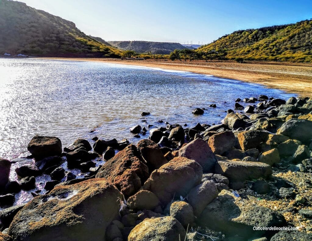 São Tomé Beach in Santiago Island, Cape Verde, with soft sand, turquoise ocean, and peaceful surroundings near the mountains and the village of São Tomé.