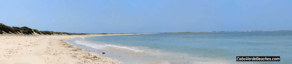 Praia Real beach on Maio Island with pristine white sand, crystal-clear turquoise waters, and serene, untouched surroundings ideal for turtle watching and beach walks